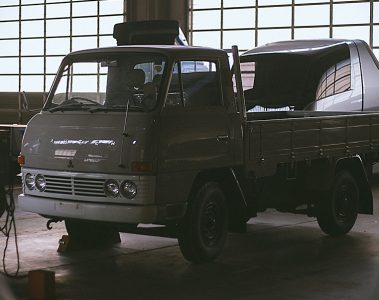 197s Mitsubishi Canter and Canter Eco D in a warehouse: part of the Fuso heritage truck collection