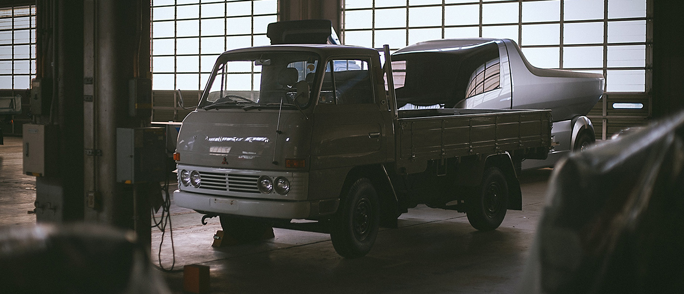 197s Mitsubishi Canter and Canter Eco D in a warehouse: part of the Fuso heritage truck collection